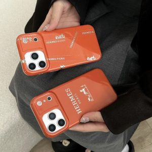 エルメス iPhone ケース オレンジ おしゃれ ロゴプリント 手帳型 大人向け