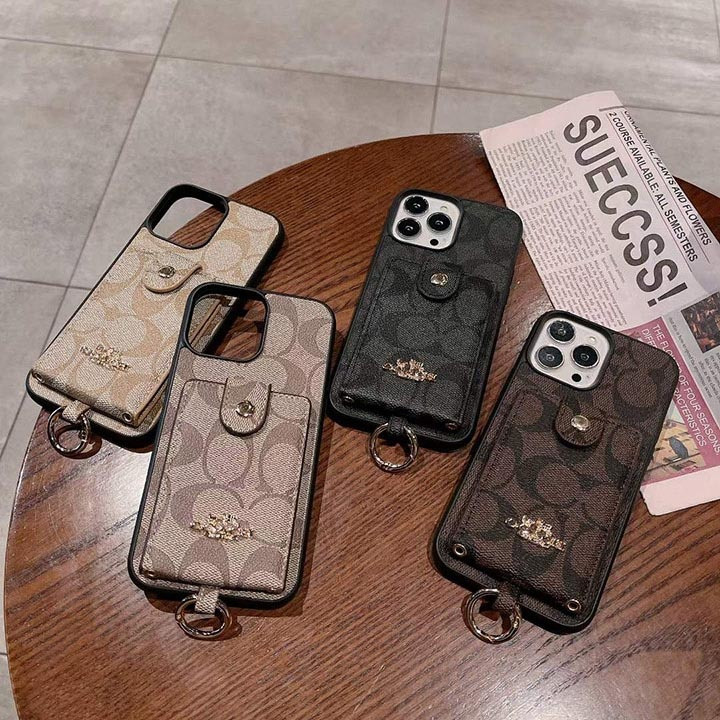 コーチ iPhone ケース シグネチャー キャンバス 背面カード入れ リング付き ストラップホール